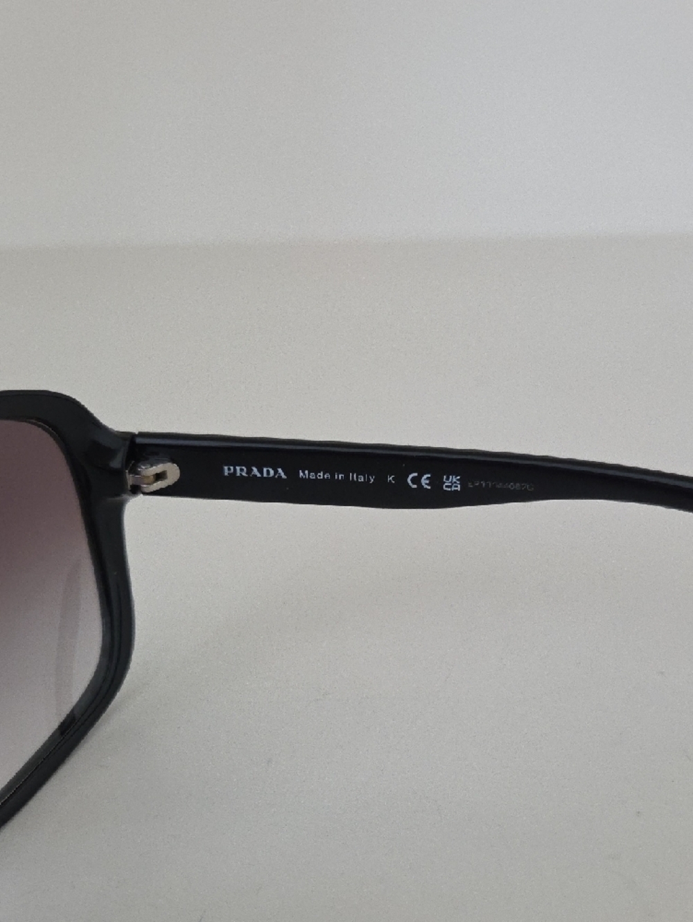 Prada Women’s Black Frame Sunglasses with Smoky Lenses - Picture 3 of 6